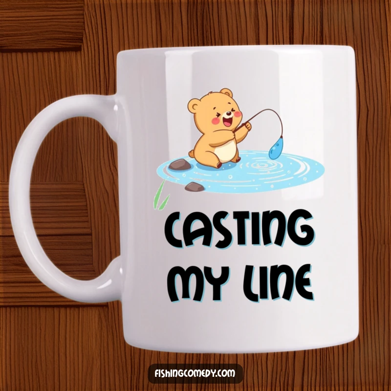 Funny mug with a happy bear cub casting a fishing line into a sparkly blue lake, peaceful angler, perfect gift.
